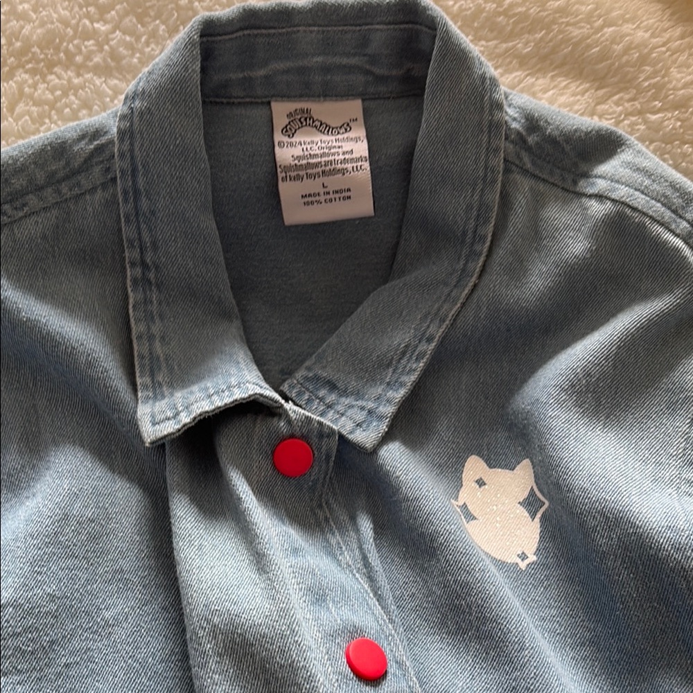 Blue Denim Jacket with Red Buttons